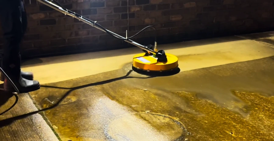 Surface cleaner removing heavy buildup from concrete in Jacksonville, FL